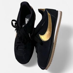 Nike Black and Gold Cortez Sneakers Classic Design